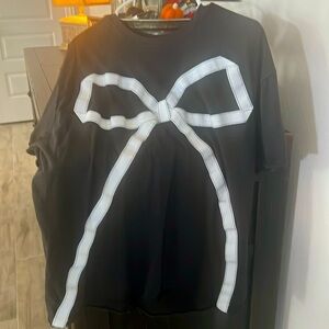 Free People Oversized Ribbon Bow T shirt size Small